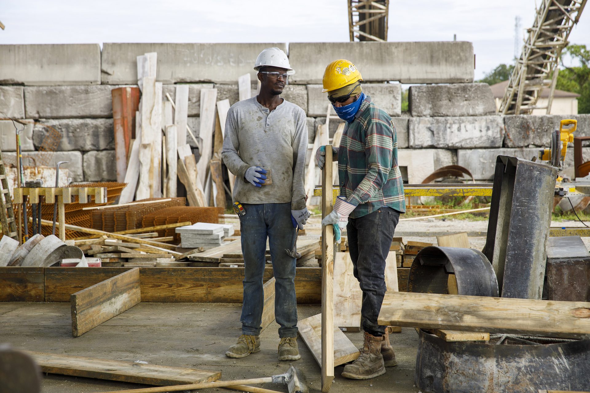 Atlantic TNG workers on construction site with safety helmets