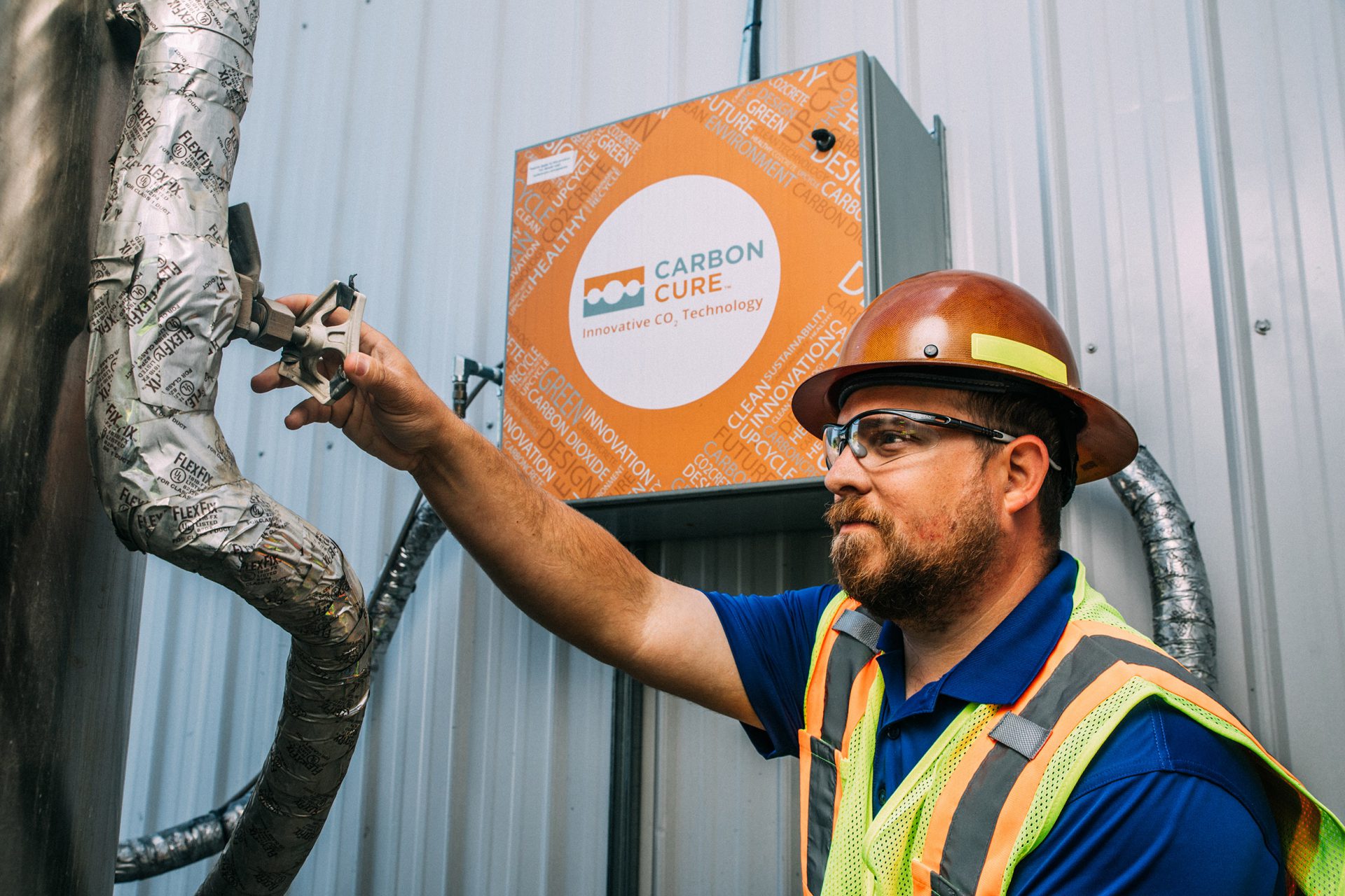 Worker with CarbonCure valve box in Atlanta