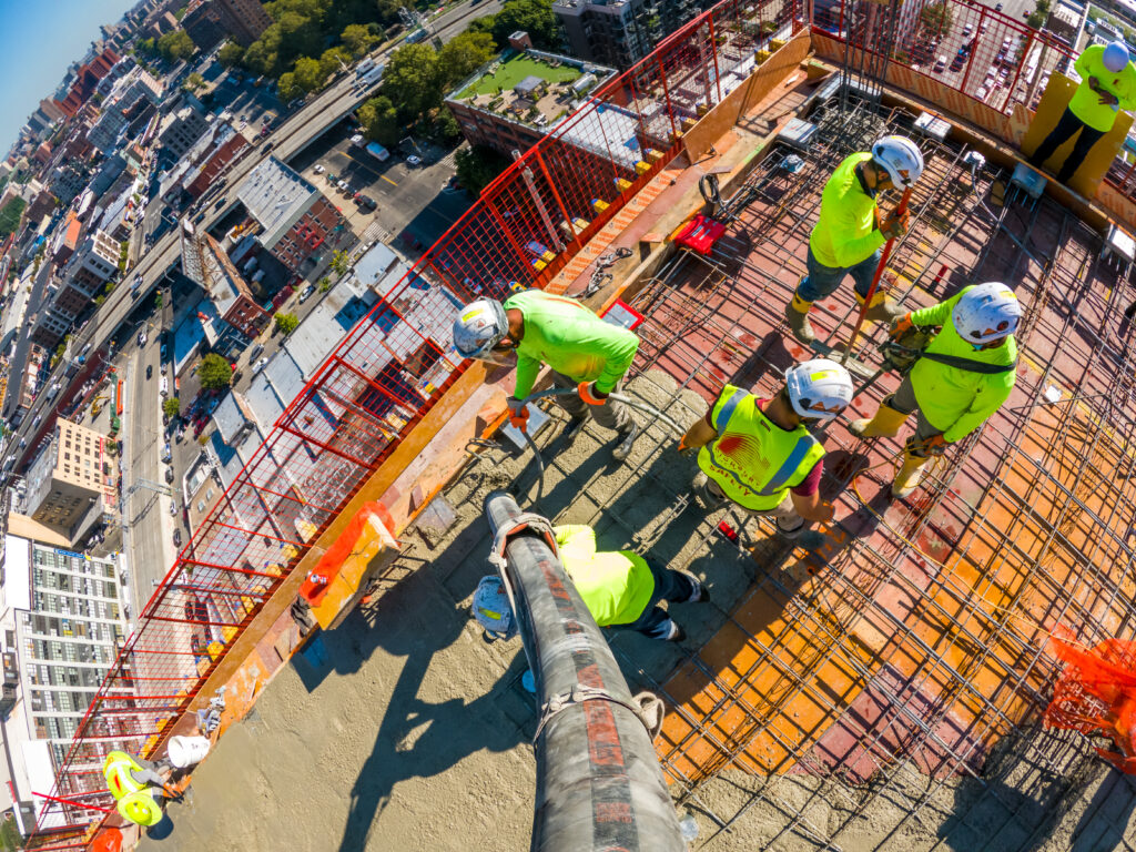 Highbury Concrete construction workers pouring concrete in skyscraper project