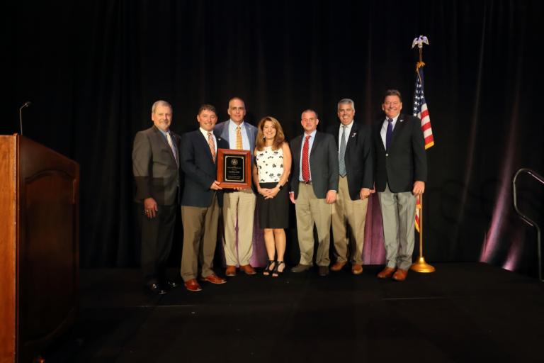 award photo of members of CAGC