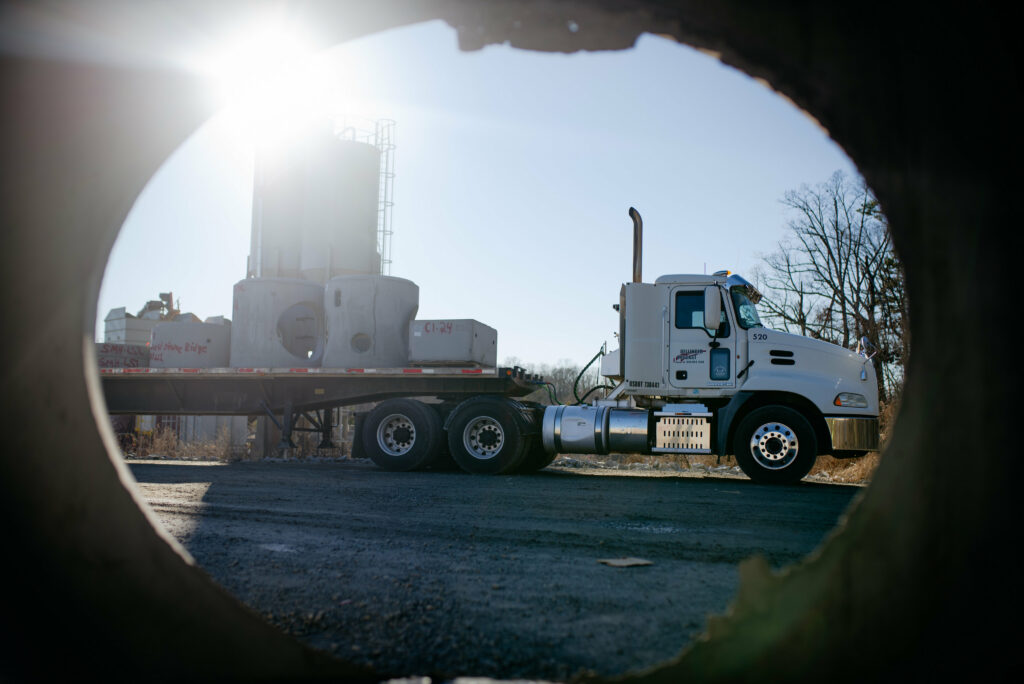 view of transport truck through precast pipe