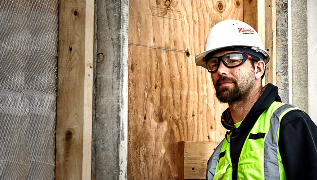 construction worker male wearing milwaukee hard hat 