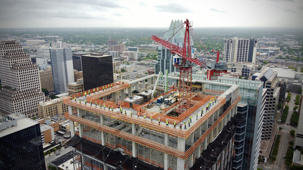 aerial view of BCS team on skyscraper building roof