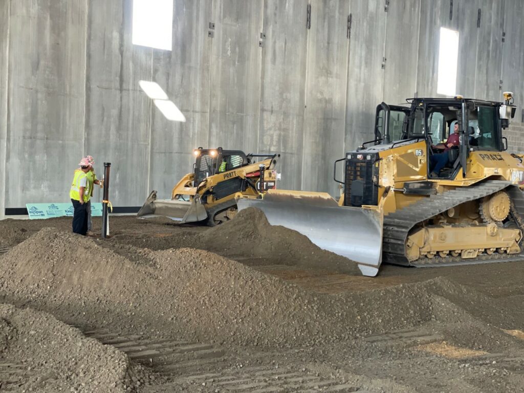 pratt bulldozers pushing dirt