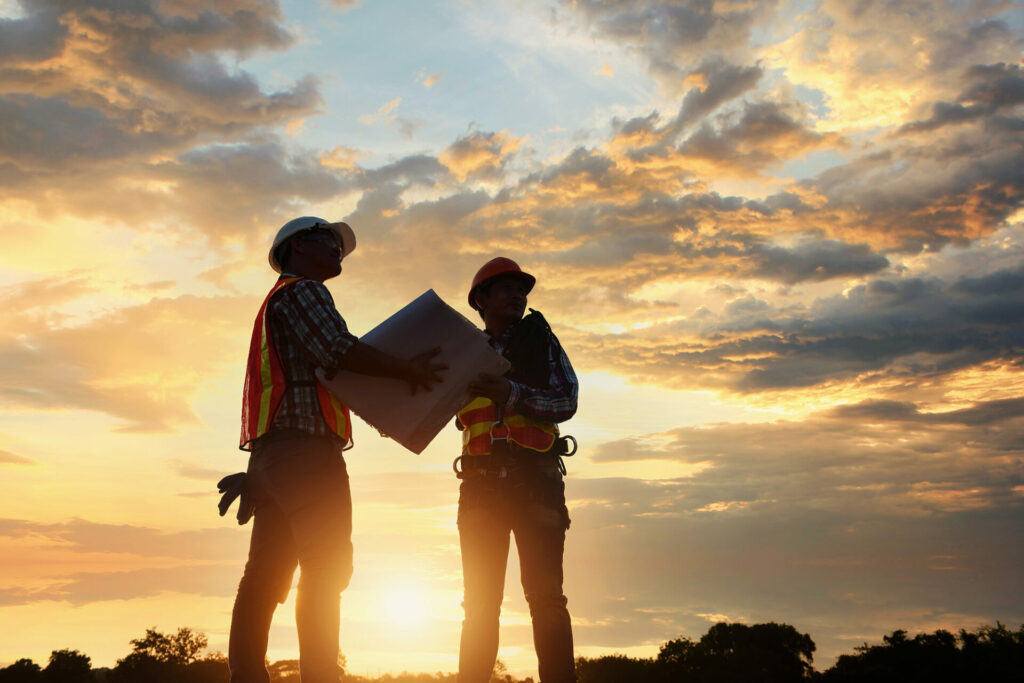 two engineers on job site with HCCA