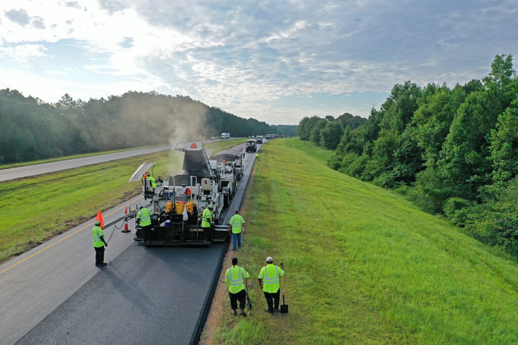 warren paving crew working on asphalt highway job