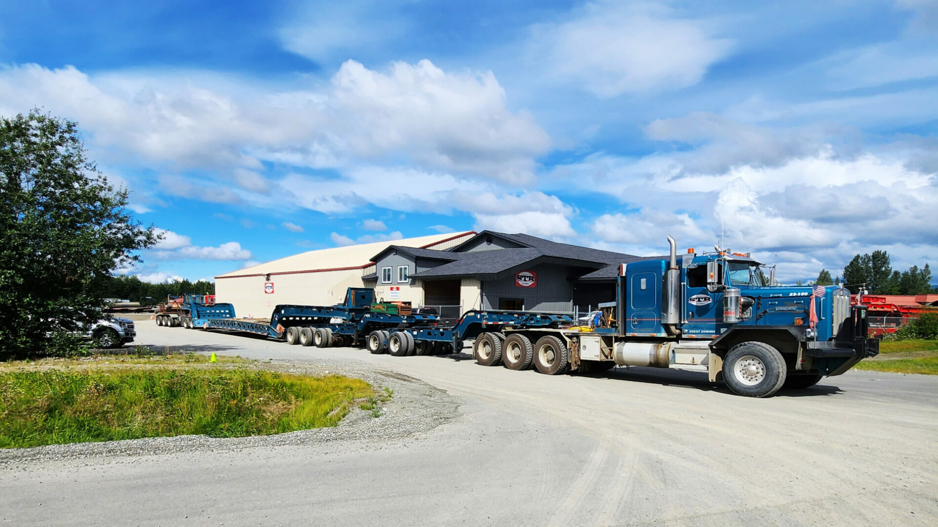 STR Alaska trucks parked outside