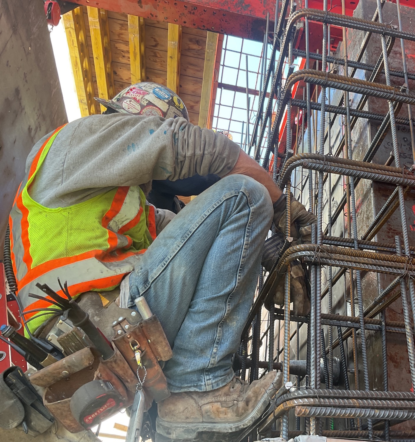 MKE Iron Erectors Inc. ironworker working on The Couture building