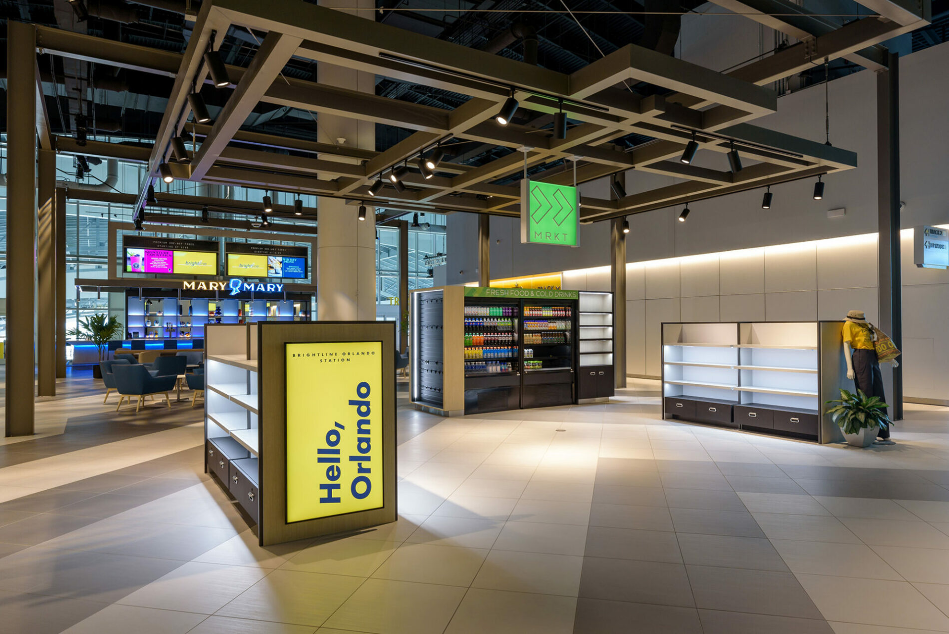 The interior of a subway station waiting area.